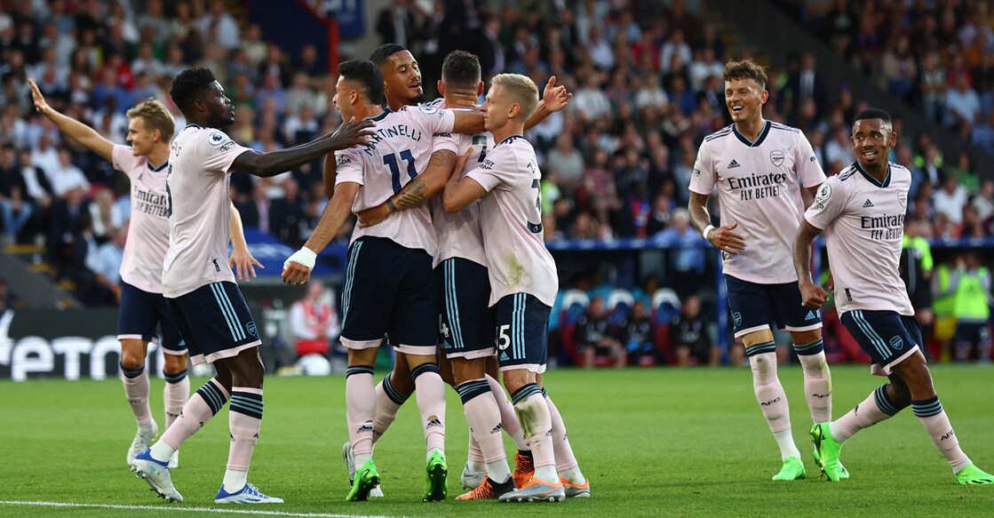 Arsenal players celebrate their opening goal. Photo: Reuters/David Klein