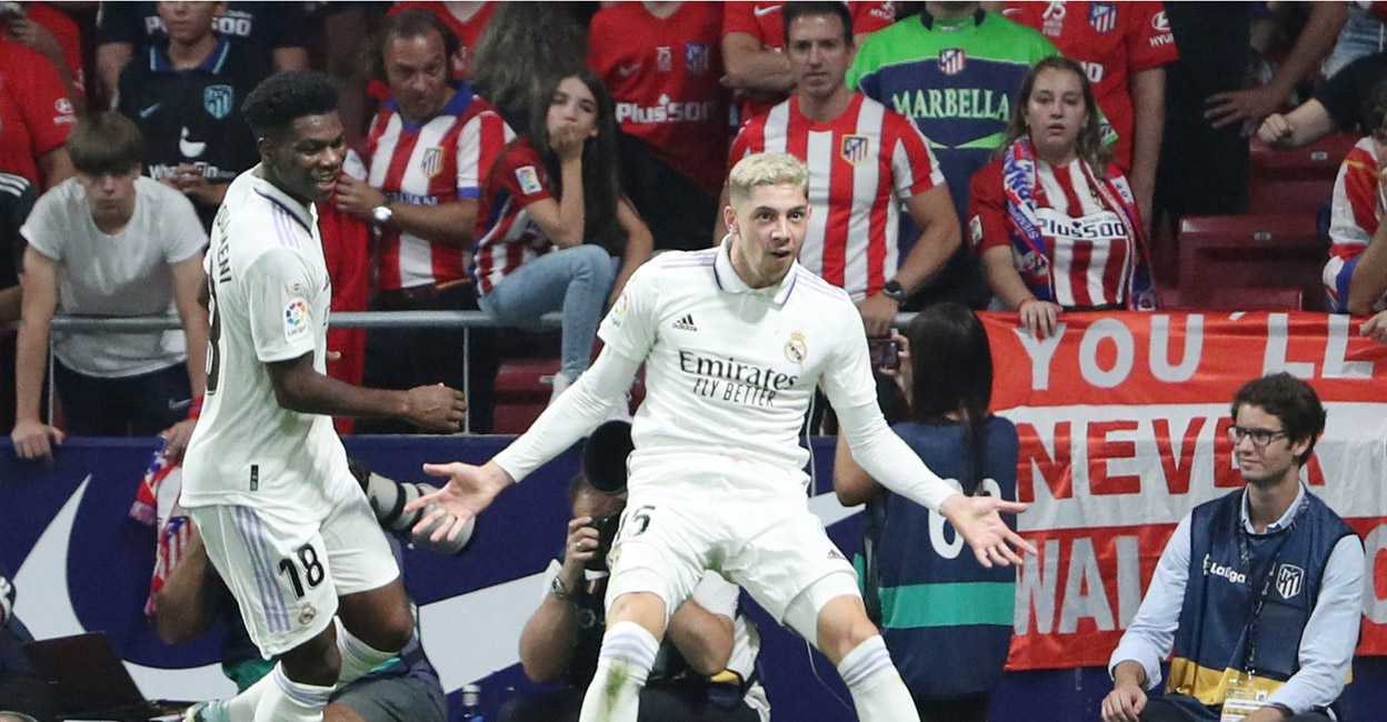 Real Madrid's Federico Valverde, right, celebrates with Aurelien Tchouameni after scoring their second goal. Photo: Reuters/Violeta Santos Moura