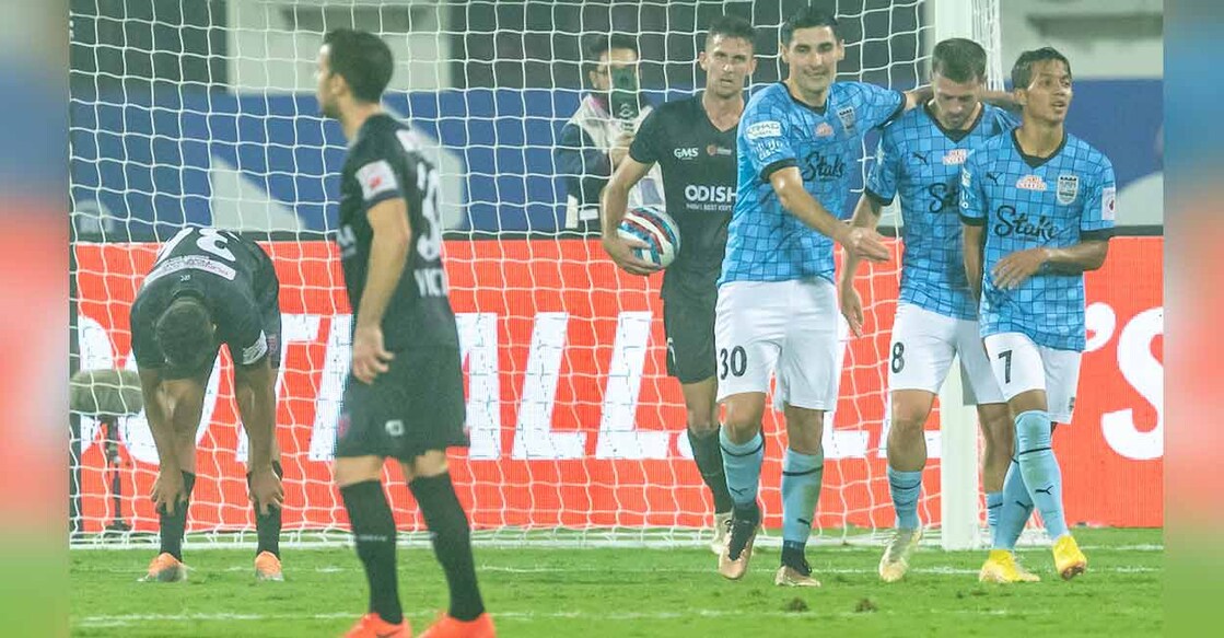 Mumbai City players celebrate a goal against Odisha. Photo: ISL
