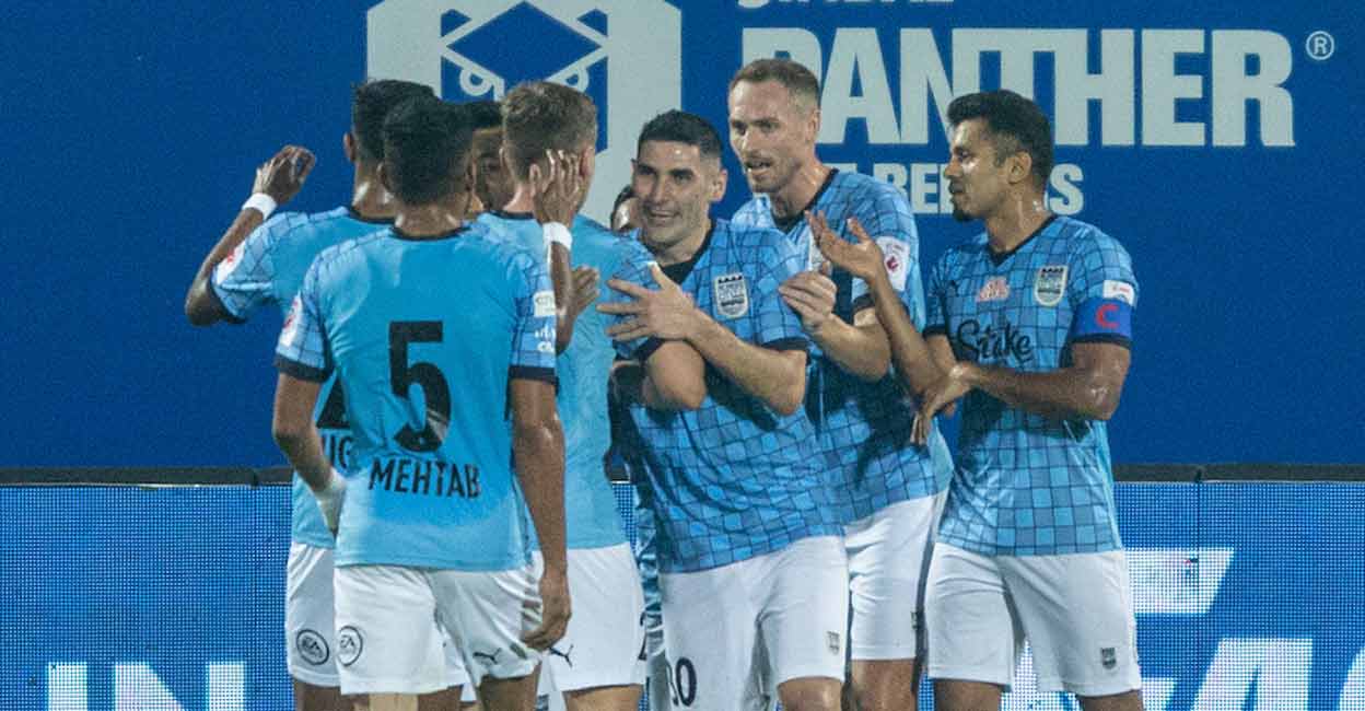 Mumbai City players celebrate a goal against Kerala Blasters in the ISL. Photo: ISL