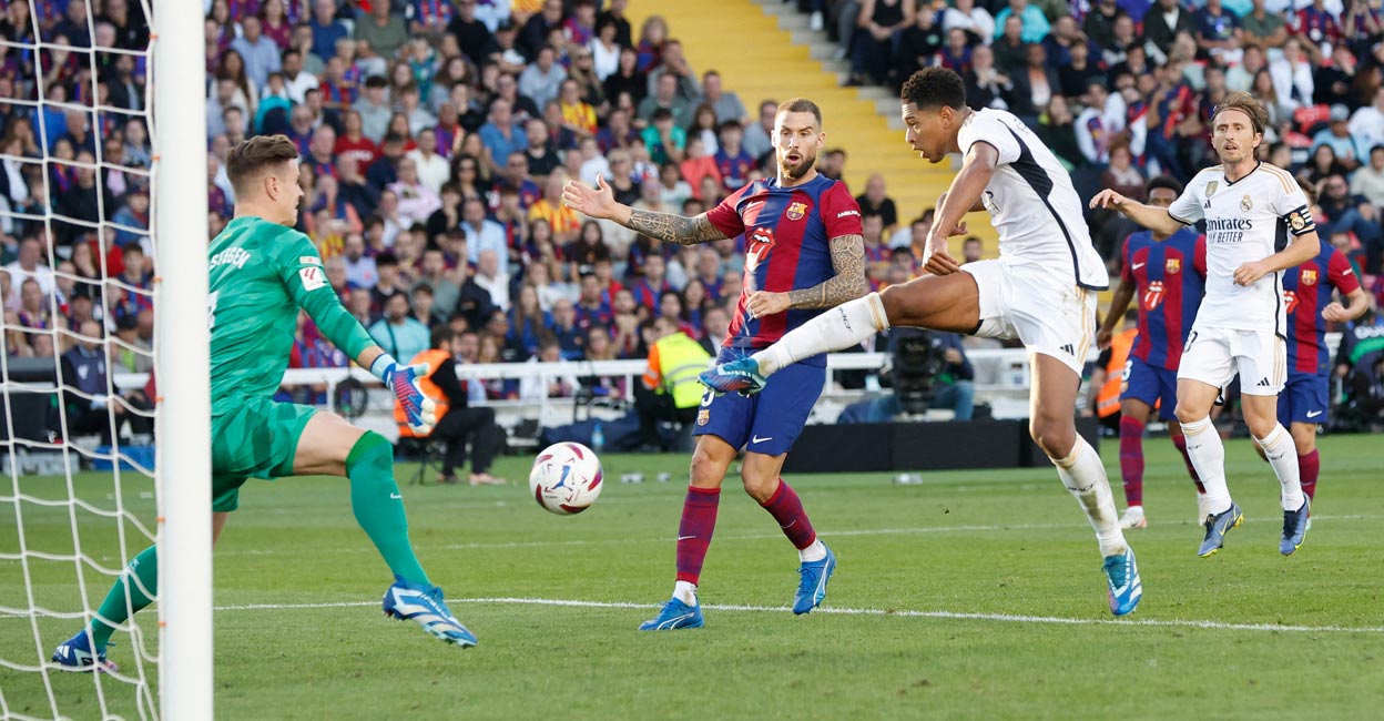 Jude Bellingham Real Madrid's Jude Bellingham scores the winning goal. Photo: Reuters/Albert Gea
