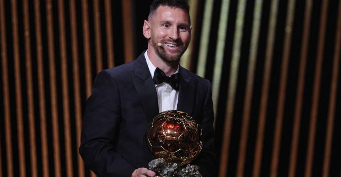 Inter Miami CF's Argentine forward Lionel Messi reacts on stage with his trophy as he receives his 8th Ballon d'Or award during the 2023 Ballon d'Or France Football award ceremony . Photo: Franck Fifie/ AFP