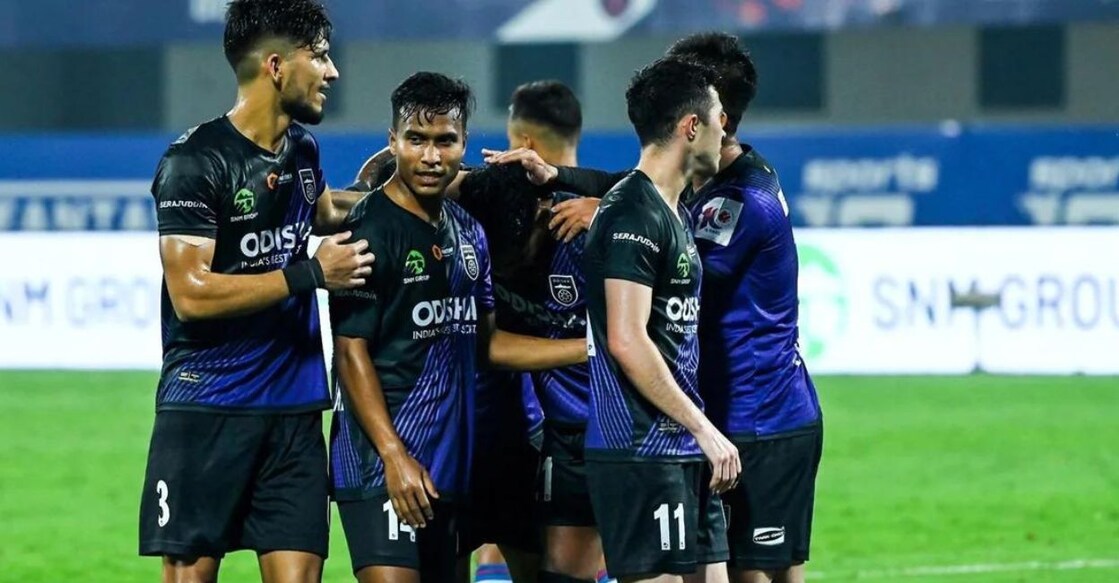 Players of Odisha FC celebrate a goal against Bengaluru FC. Photo: ISL