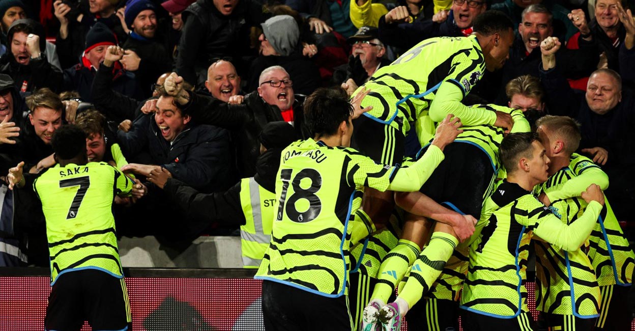 Gunners on top Arsenal players celebrate their goal against Brentford. Photo: AFP/Adrian Dennis