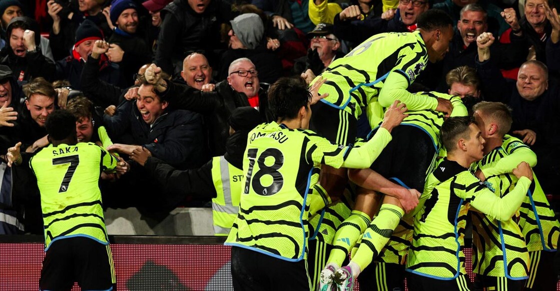 Gunners on top Arsenal players celebrate their goal against Brentford. Photo: AFP/Adrian Dennis