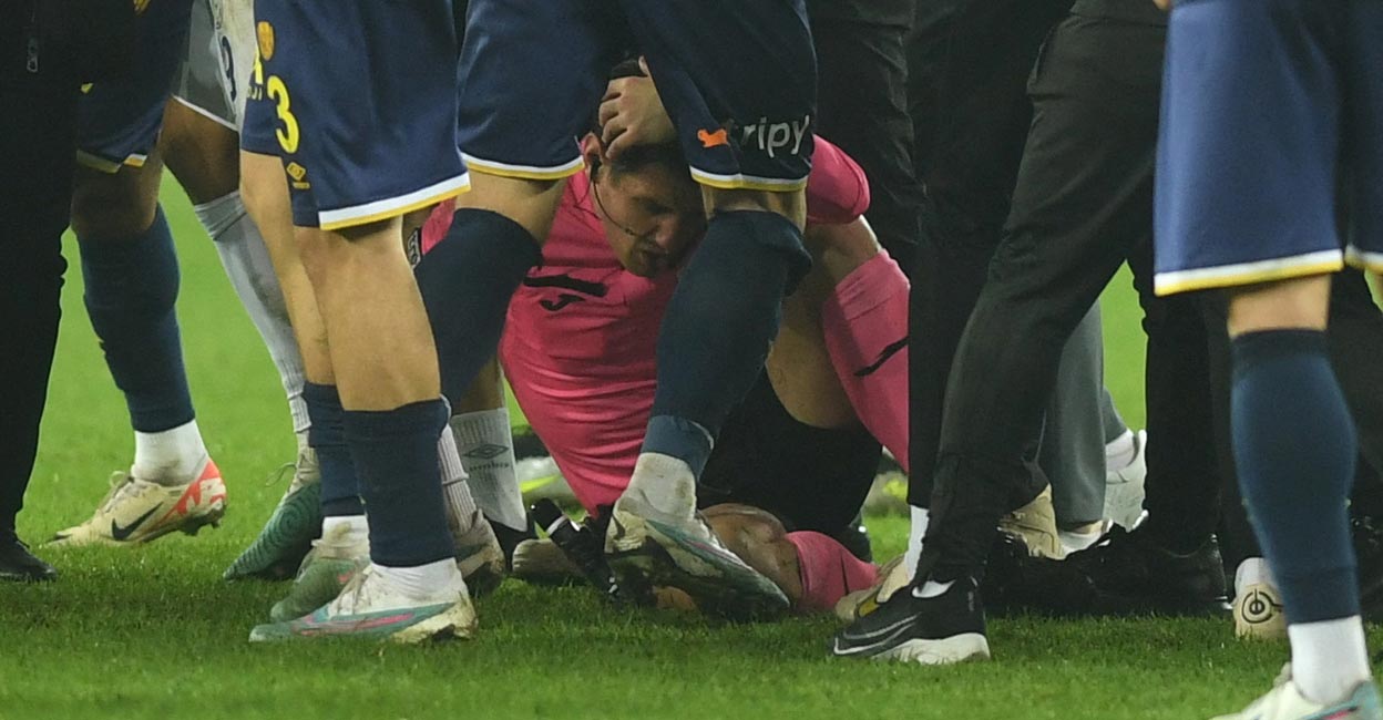 Referee Halil Umut Meler lies on the ground at the end of the match. Photo: Reuters/Abdurrahman Antakyali/Depo Photo