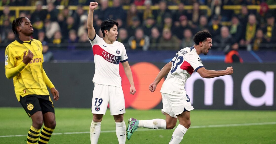 Paris Saint-Germain's Warren Zaire-Emery, right, celebrates after scoring the equaliser. Photo: AFP/ Franck Fife 