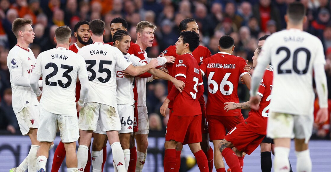 Liverpool and Manchester United players clash during the match. Photo: Reuters/Molly Darlington