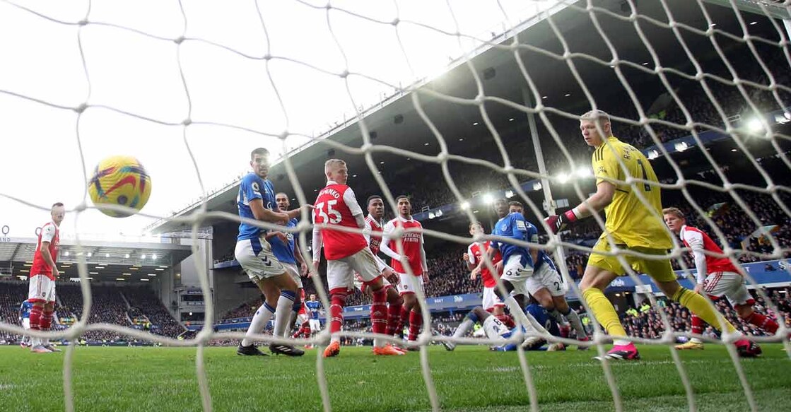 Everton's James Tarkowski scores their first goal past Arsenal's Aaron Ramsdale. Photo: Reuters/ Carl Recines