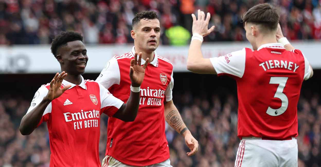 Arsenal's Bukayo Saka celebrates scoring their fourth goal with Kieran Tierney and Granit Xhaka. Photo: Reuters/David Klein
