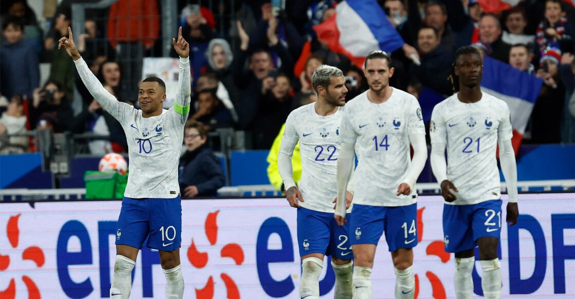 France's Kylian Mbappe celebrates scoring their fourth goal with Theo Hernandez, Adrien Rabiot and Eduardo Camavinga during UEFA Euro 2024 Qualifiers - Group B - France v Netherlands match. Photo: REUTERS/Gonzalo Fuentes