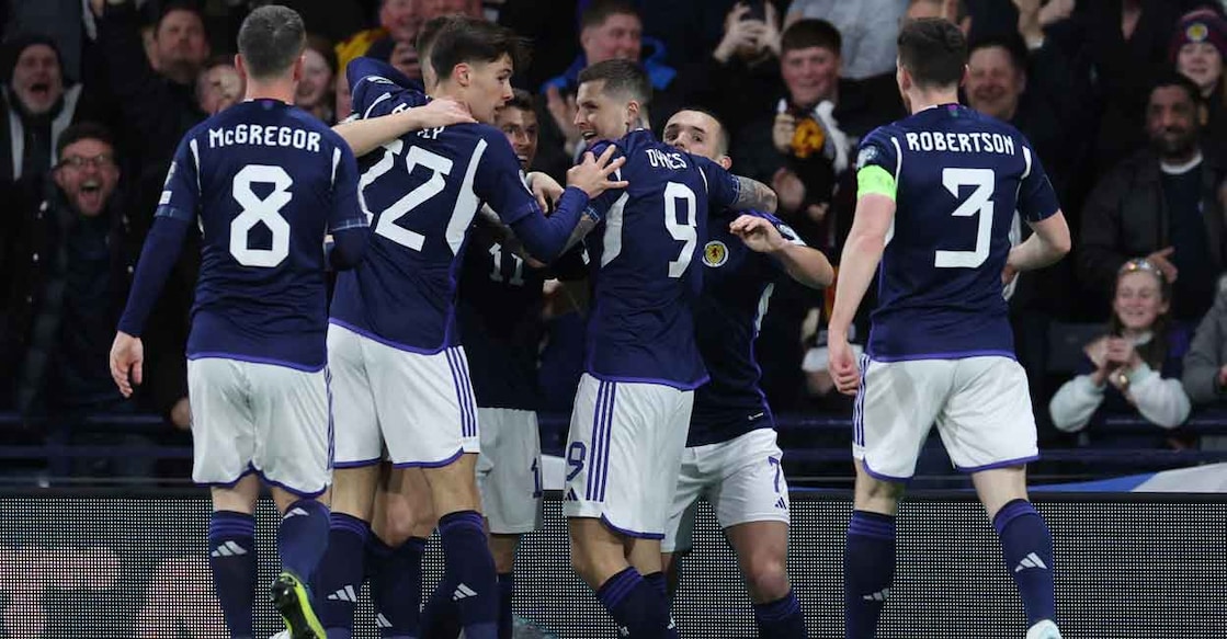 Scotland players celebrate their opening goal. Photo: Reuters/Russell Cheyne