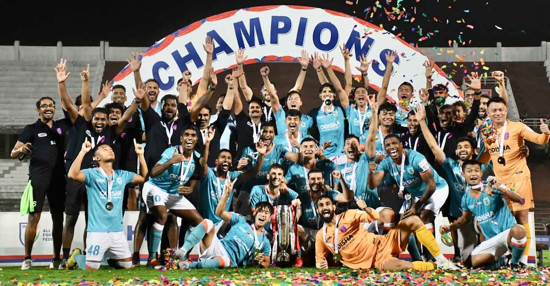 Odisha FC players and support staff celebrate with the trophy. Photo: Twitter@IndianFootball