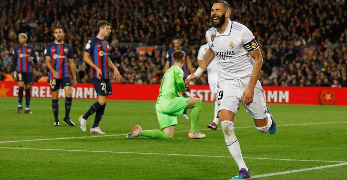 Real Madrid's Karim Benzema celebrates scoring their fourth goal to complete his hat-trick. Photo: Reuters/Albert Gea