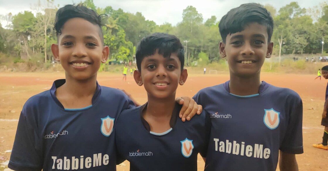 Ayman Bilal (extreme right) with Alvin Alexander and Jeevan Joseph who attended a national camp in preparation for the Gothia Cup. Photo: Special arrangement