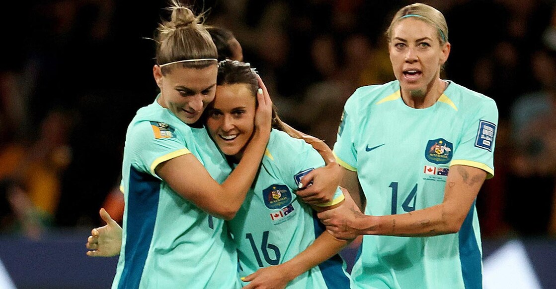Australia's Hayley Raso, centre, celebrates with Stephanie Catley, left, and Alanna Kennedy after scoring the opening goal. Photo: Reuters/Asanka Brendon Ratnayake