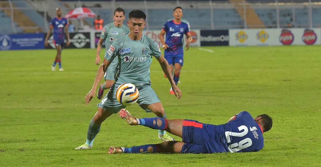 Action between Bengaluru FC (blue) and Kerala Blasters during a Group C match of the Durand Cup at the Kishore Bharati Krirangan in Kolkata on Friday. Photo: Twitter/@thedurandcup
