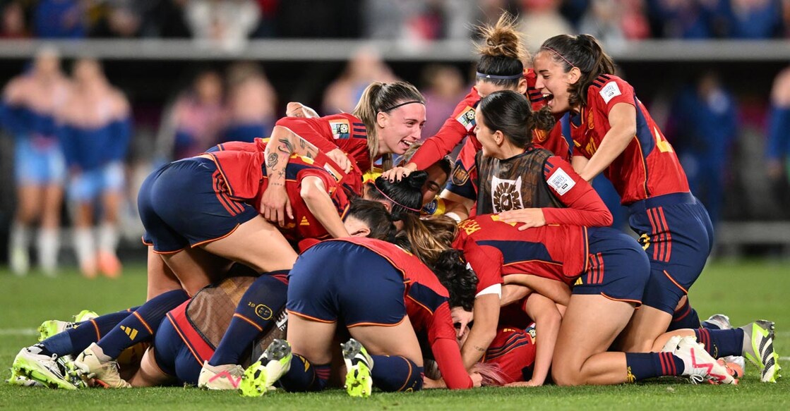 Spanish players celebrate their triumph at the end of the final. Photo: AFP/Izhar Khan