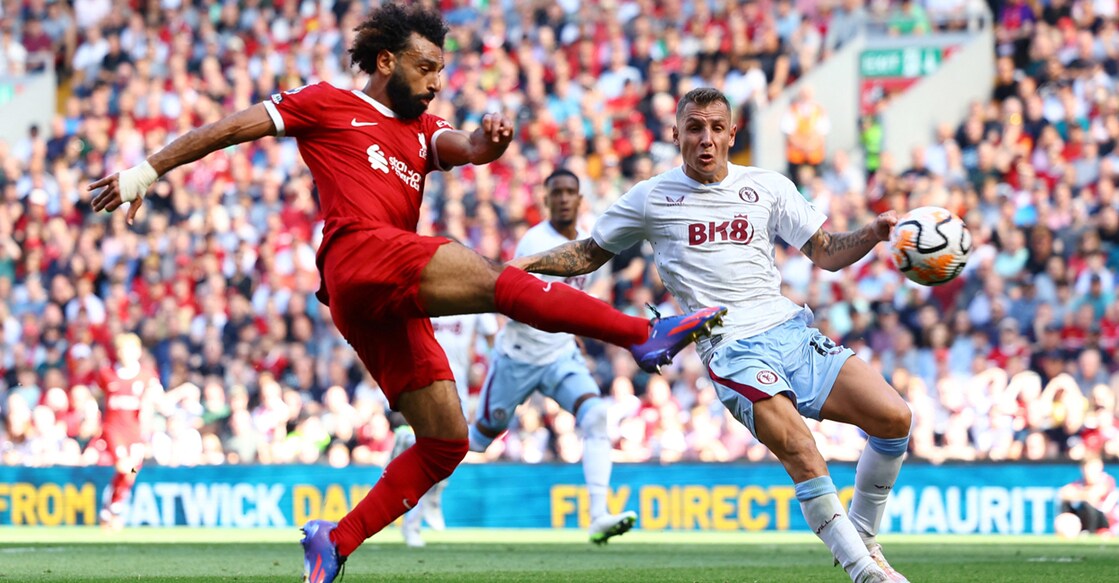 Liverpool's Mohamed Salah in action with Aston Villa's Lucas Digne. Photo: Reuters/Molly Darlington