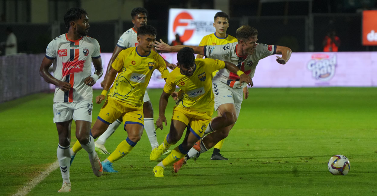 Action between Thiruvananthapuram Kombans (yellow) and Malappuram FC in Thiruvananthapuram on Wednesday. Photo: Special arrangement