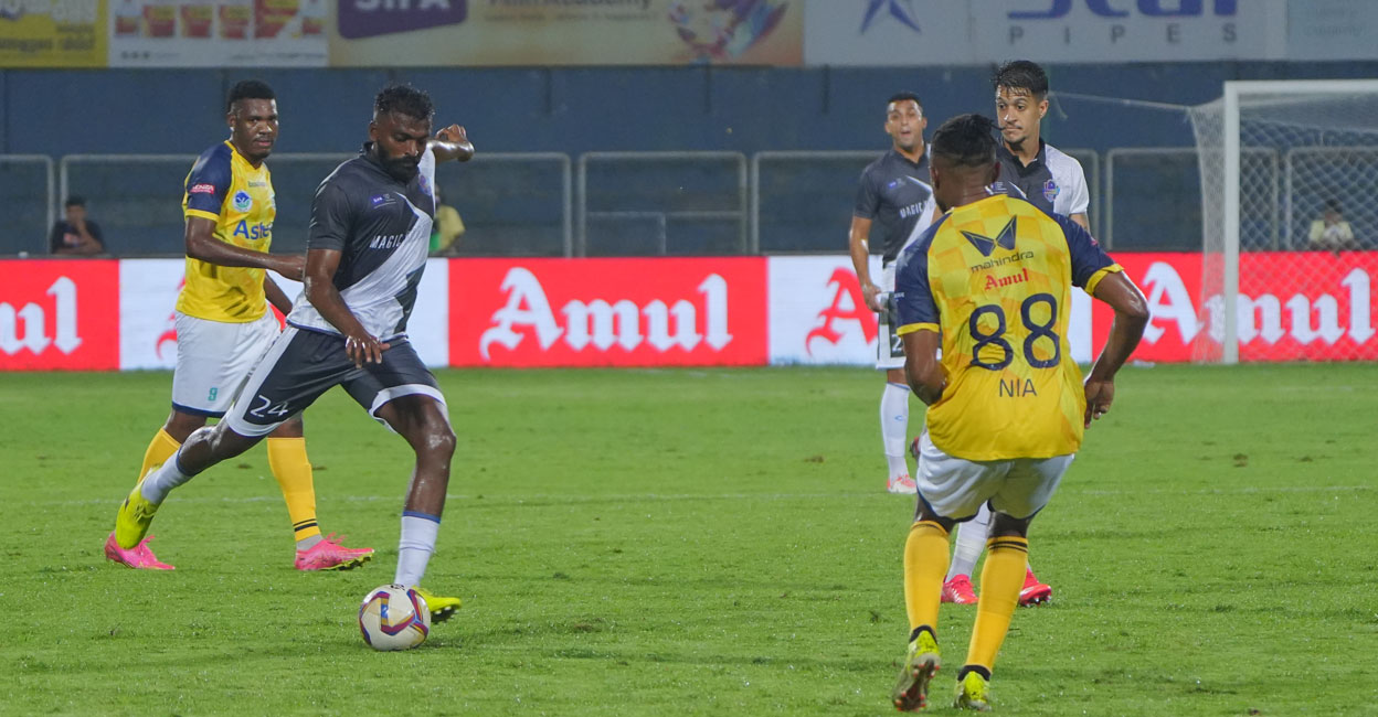 calicut-fc-vs-thrissur-magic Action between Calicut FC (yellow) and Thrissur Magic in a Super League Kerala match at the Payyanad Stadium in Manjeri on Saturday. Photo: Special arrangement