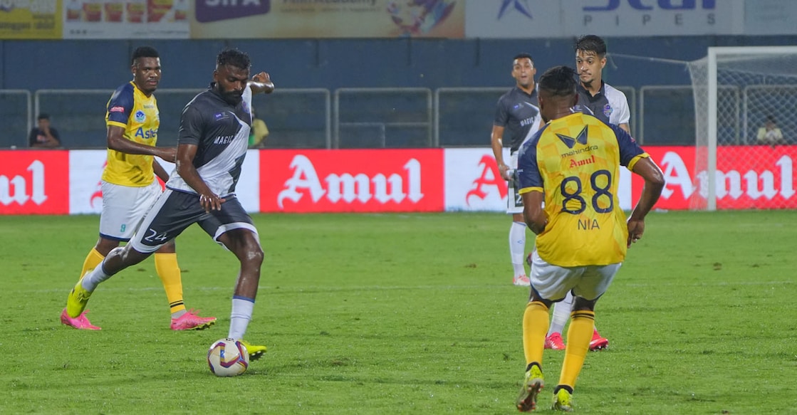Action between Calicut FC (yellow) and Thrissur Magic in a Super League Kerala match at the Payyanad Stadium in Manjeri on Saturday. Photo: Special arrangement