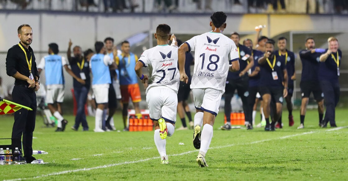 Thoi Singh celebrates his goal for Calicut FC in front of Forca Kochi head coach Mario Lemos during the final of Super League Kerala at the EMS Corporation Stadium in Kozhikode on Sunday. Photo: Special arrangement