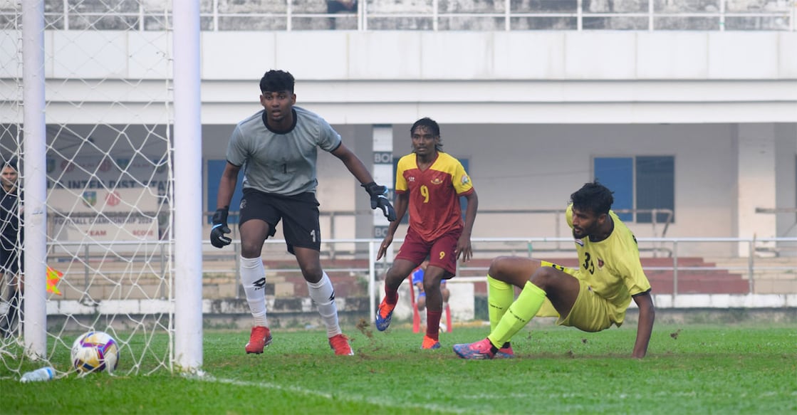 Muhammed Ashiq (green) of Railways gets a goal against Pondicherry in Group H qualifiers of the Santosh Trophy at the EMS Corporation Stadium in Kozhikode on Friday. Photo: Special arrangement