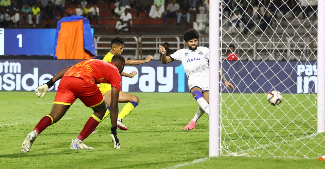 John Kennedy scores Calicut FC's first goal against Thiruvananthapuram Kombans in the first semifinal of Super League Kerala in Kozhikode on Tuesday. Photo: Special arrangement 
