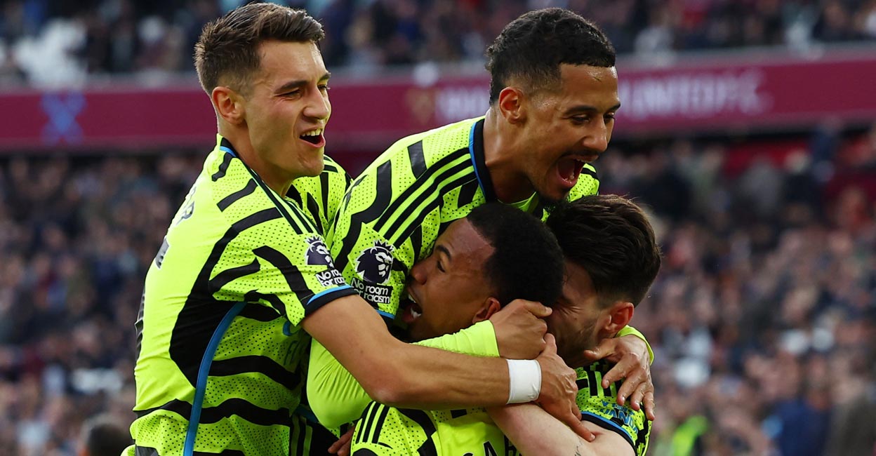 Arsenal's Gabriel, second right, celebrates with teamamtes after scoring their third goal. Photo: Action Images/Paul Childs via Reuters