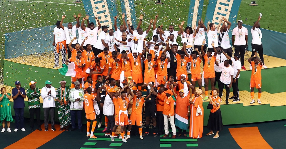 Ivory Coast players celebrate with the trophy after winning the Africa Cup of Nations. Photo: Reuters. 