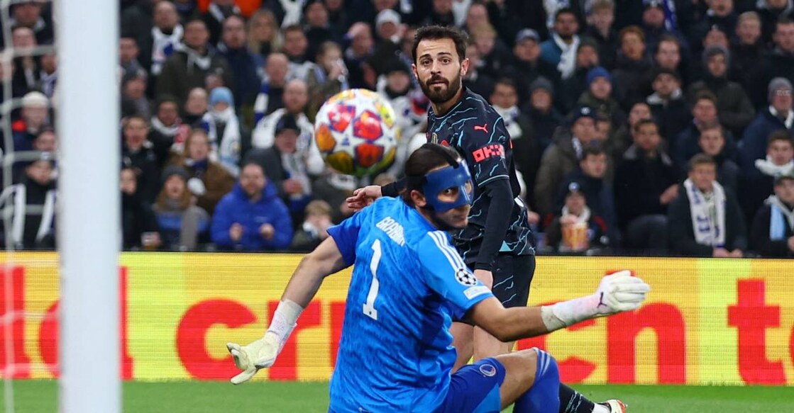 Manchester City's Bernardo Silva scores their second goal past FC Copenhagen's Kamil Grabara. Photo: Reuters