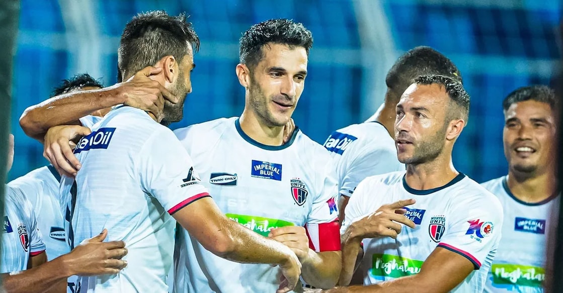 Players of NorthEast United celebrate a goal against FC Goa. Photo: ISL