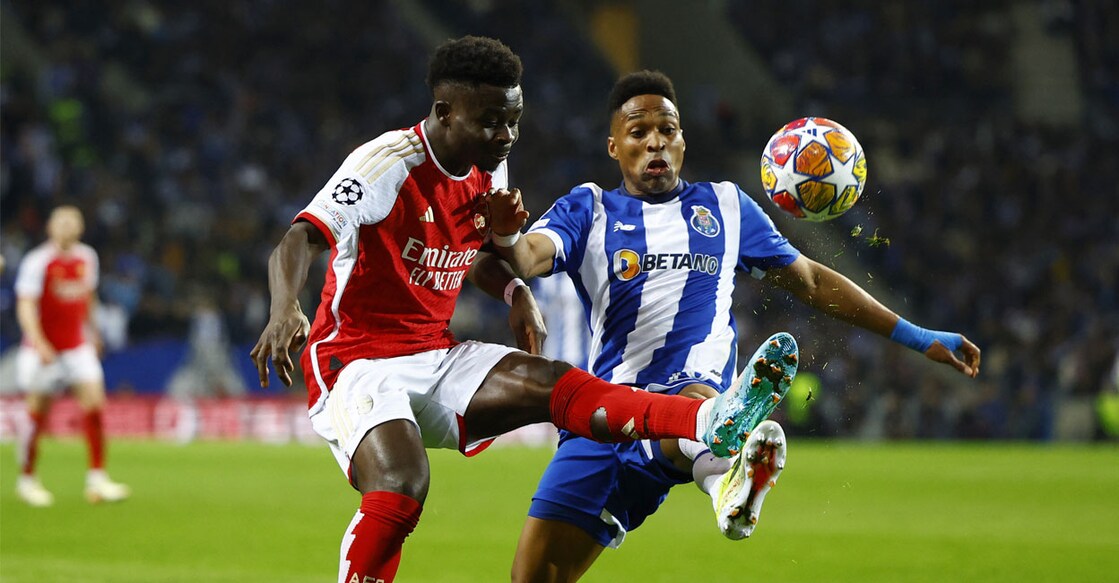 Arsenal's Bukayo Saka in action with FC Porto's Wendell. Photo: Reuters. 