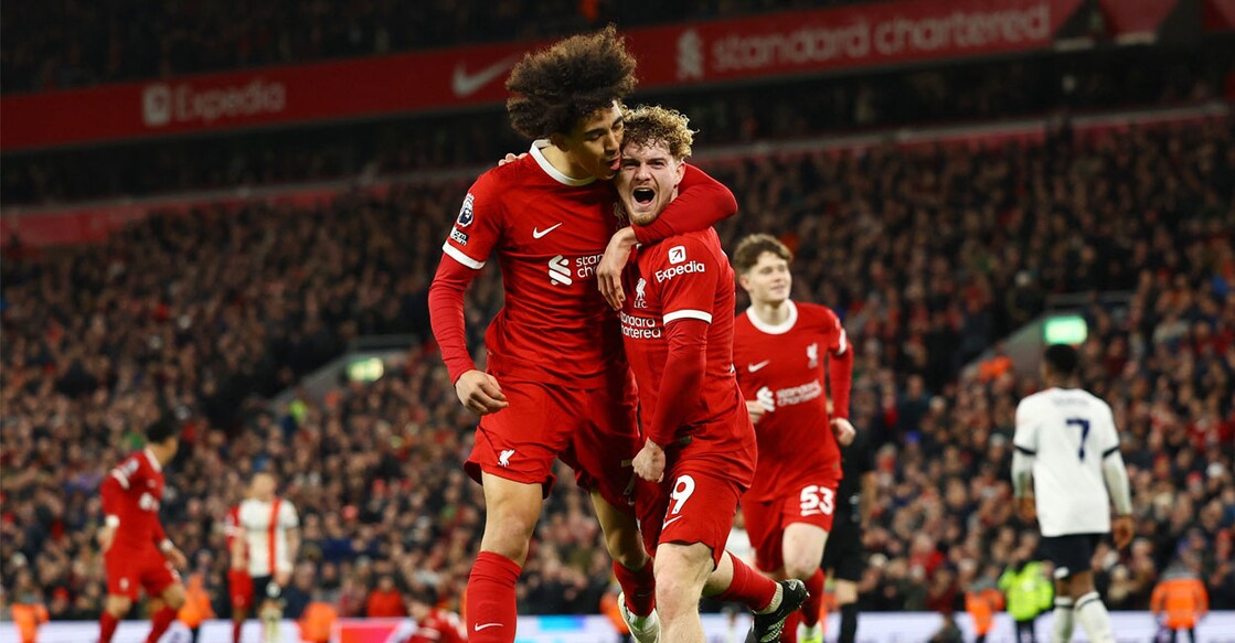 Liverpool's Harvey Elliott celebrates scoring their fourth goal with Jayden Danns. Photo: Reuters. 
