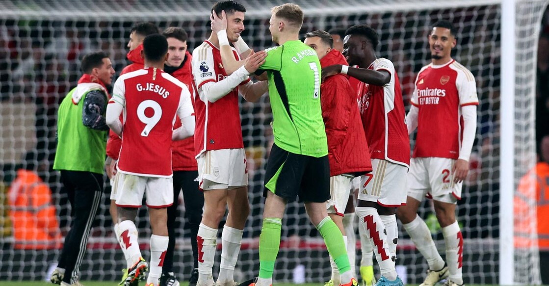 Arsenal goalkeeper Aaron Ramsdale celebrates with Kai Havertz after the match. Photo: Reuters/David Klein