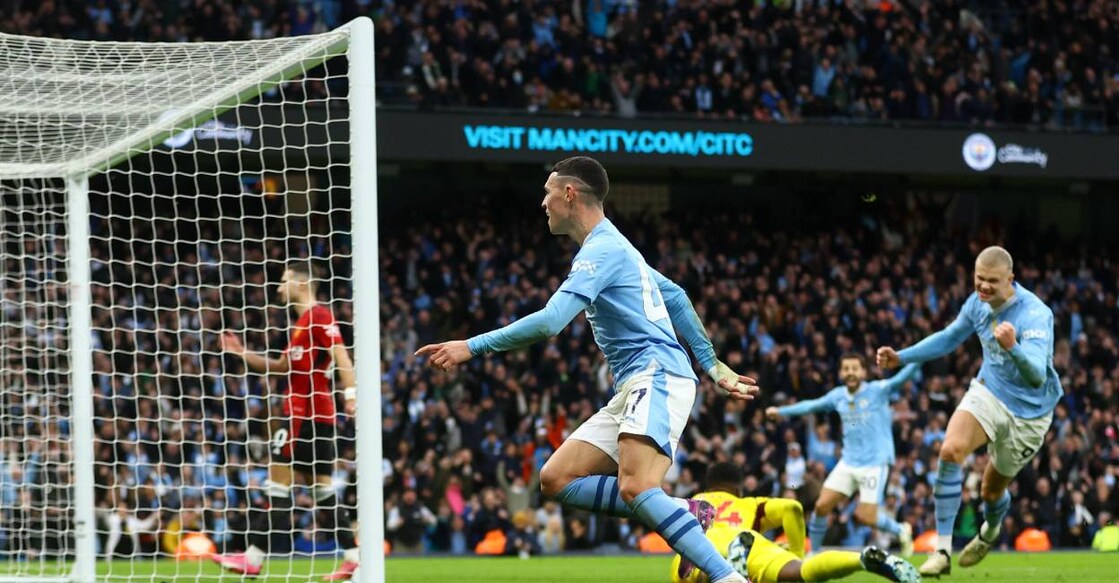 Manchester City's Phil Foden celebrates scoring their second goal with Erling Braut Haaland. Photo: Reuters