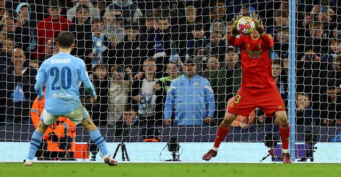 SOCCER-CHAMPIONS-MCI-MAD-REPORT Real Madrid's Andriy Lunin saves a penalty taken by Manchester City's Bernardo Silva during the penalty shootout Photo: REUTERS/Molly Darlington