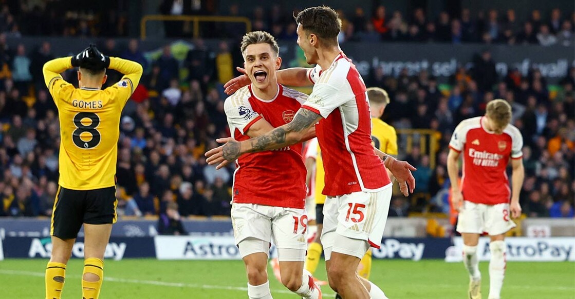 Arsenal's Leandro Trossard celebrates scoring their first goal with Jakub Kiwior. Photo: Reuters. 