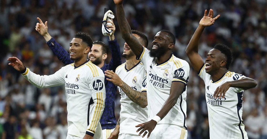 Real Madrid's Jude Bellingham, Antonio Rudiger and Vinicius Junior celebrate after the match. Photo: Reuters. 