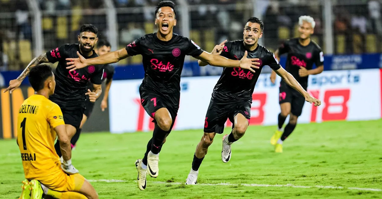 Mumbai City players celebrate a goal against FC Goa. Photo: ISL