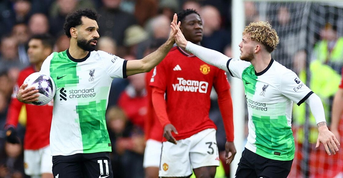 Liverpool's Mohamed Salah celebrates with Harvey Elliott after  scoring their second goal . Photo: Reuters/Carl Recine