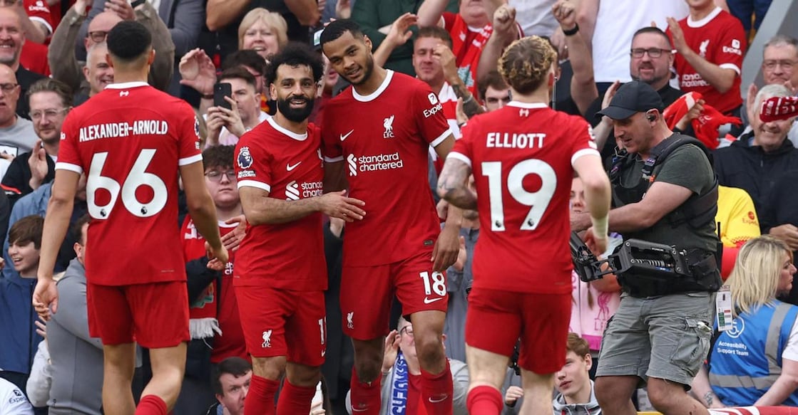 Liverpool players celebrate their third goal. Photo: AFP/Darren Staples