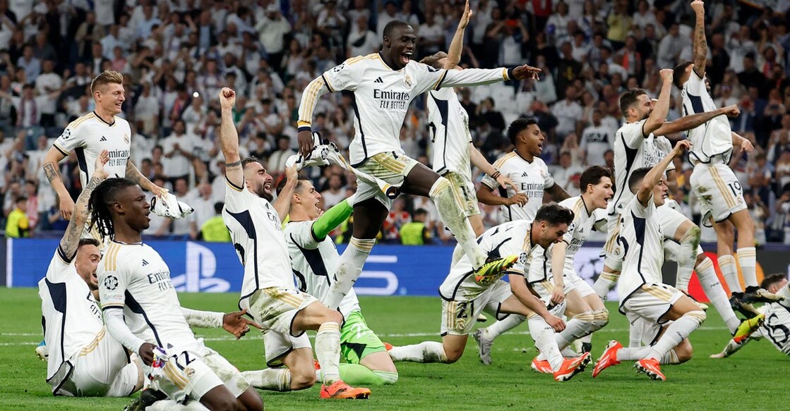 Real Madrid players celebrate after the match. Photo: Reuters/Juan Medina