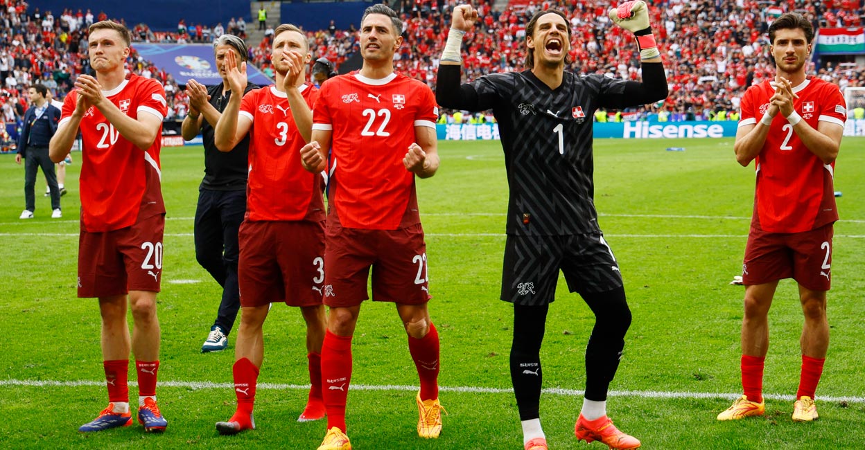 Switzerland's Michel Aebischer, Silvan Widmer, Fabian Schar, Yann Sommer and Leonidas Stergiou celebrate after the match Photo: Reuters/Wolfgang Rattay