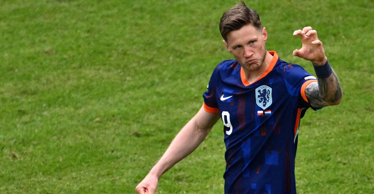 Netherlands' Wout Weghorst celebrates after scoring his team's second goal against Poland. Photo: Christophe Simon/AFP