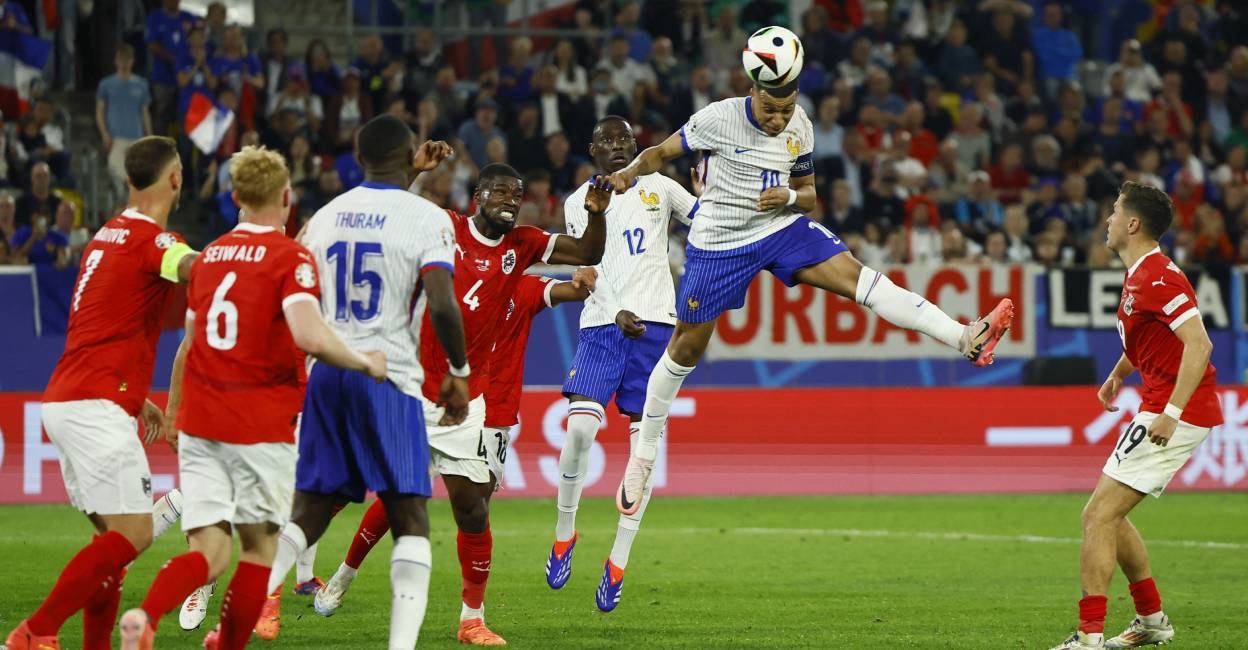 France's Kylian Mbappe in action before colliding with Austria's Kevin Danso. Photo: Reuters/Thilo Schmuelgen