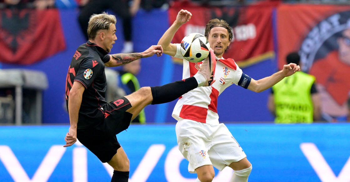 Albania's Taulant Seferi in action with Croatia's Luka Modric. Photo: Reuters/Fabian Bimmer