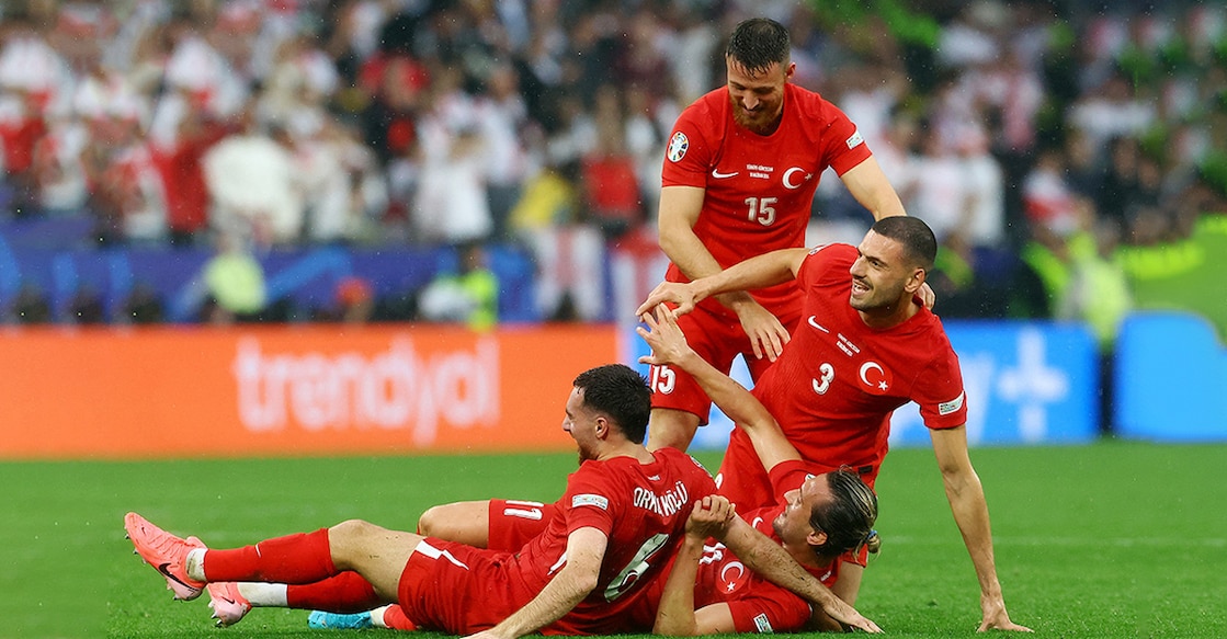 Turkey's Merih Demiral, Salih Ozcan, Yusuf Yazici and Orkun Kokcu celebrate after the match. Photo: Bernadett Szabo/ Reuters