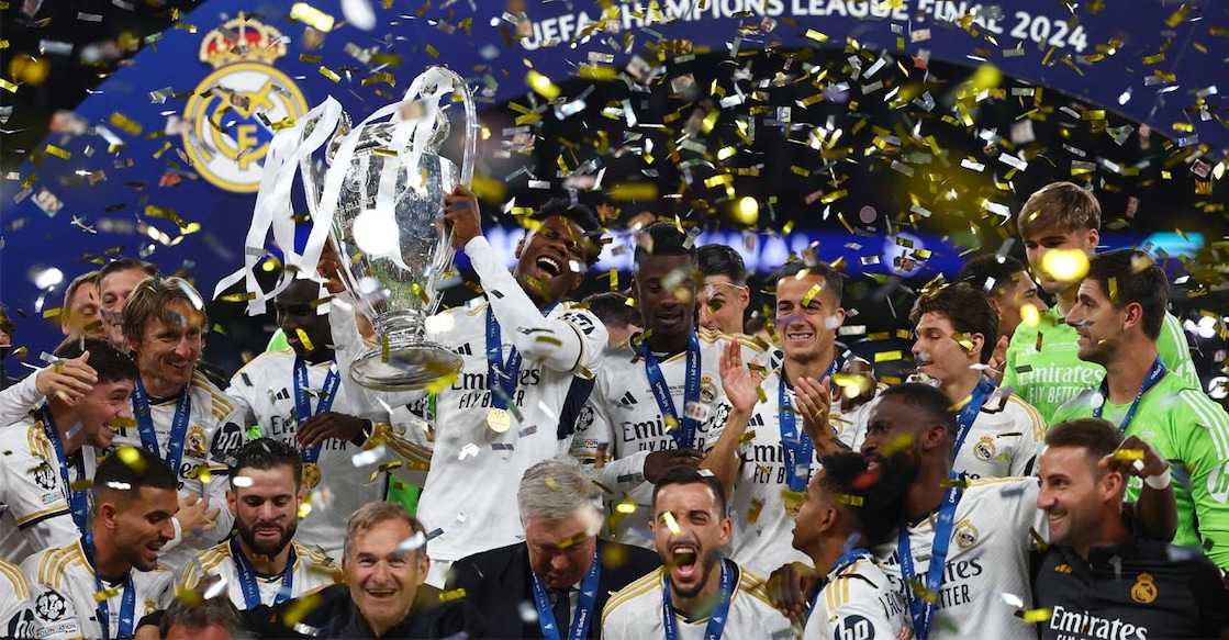 Real Madrid's Aurelien Tchouameni lifts the trophy as he celebrates with teammates after winning the Champions League. Photo: Reuters. 